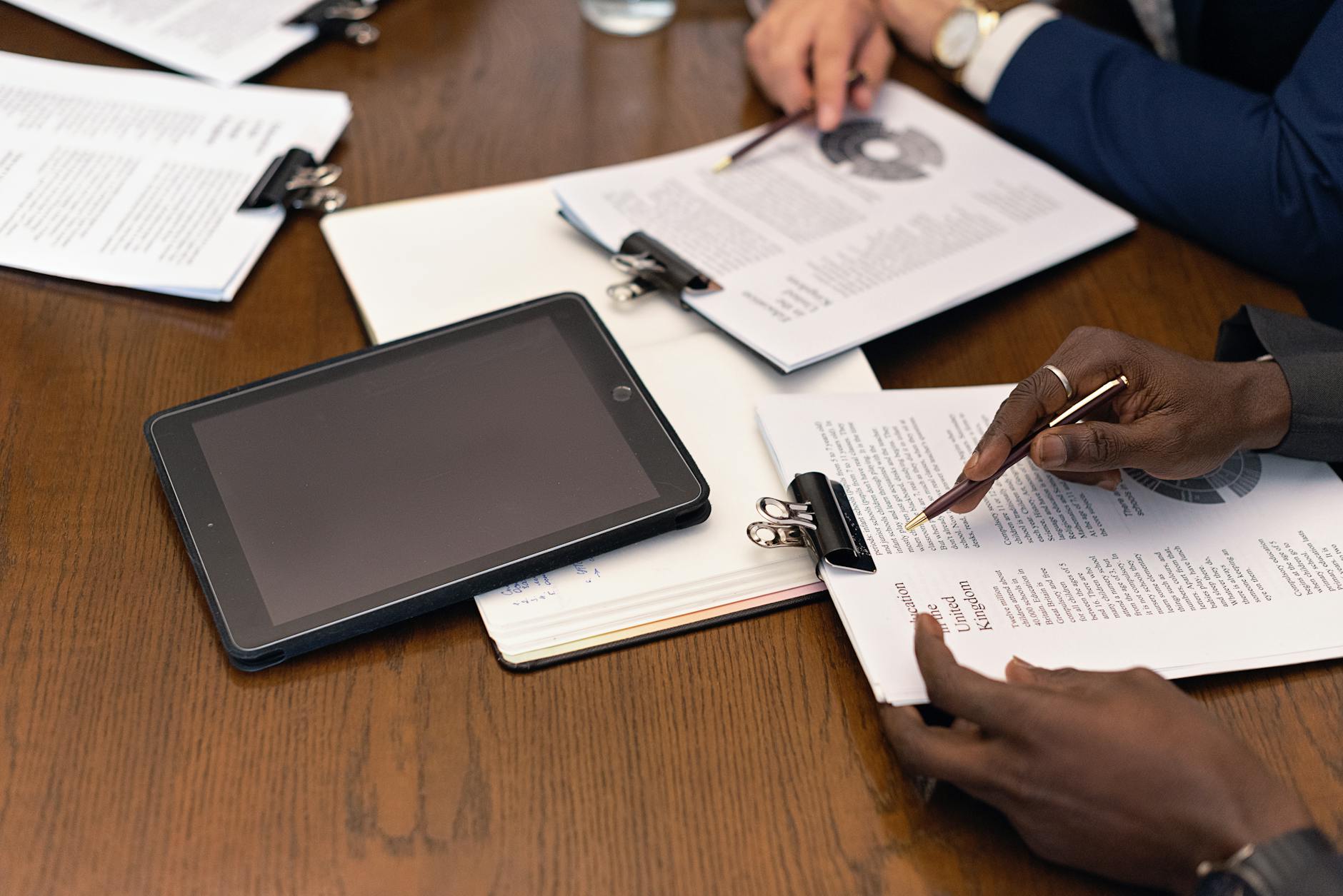 Professionals reviewing financial documents during a tax audit