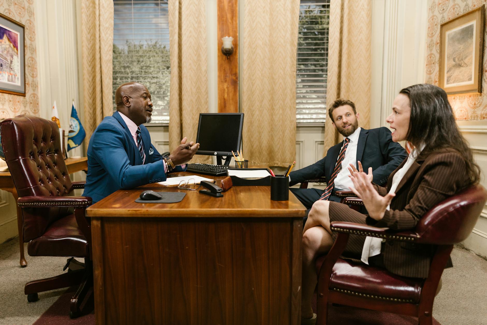 Lawyers in a professional office discussing a tax dispute case